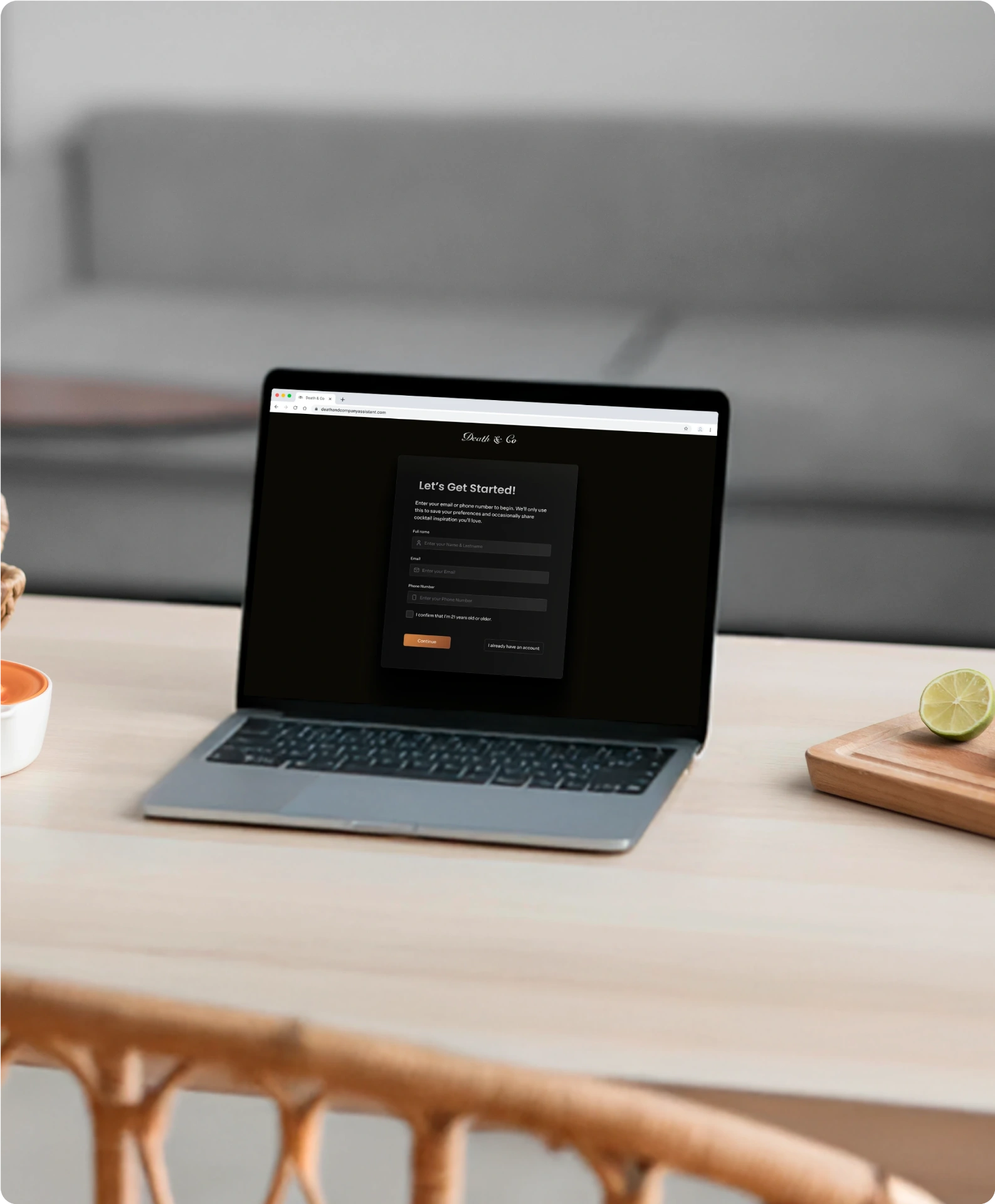 Death & Co cocktail assistant — Let's Get Started onboarding screen on a laptop